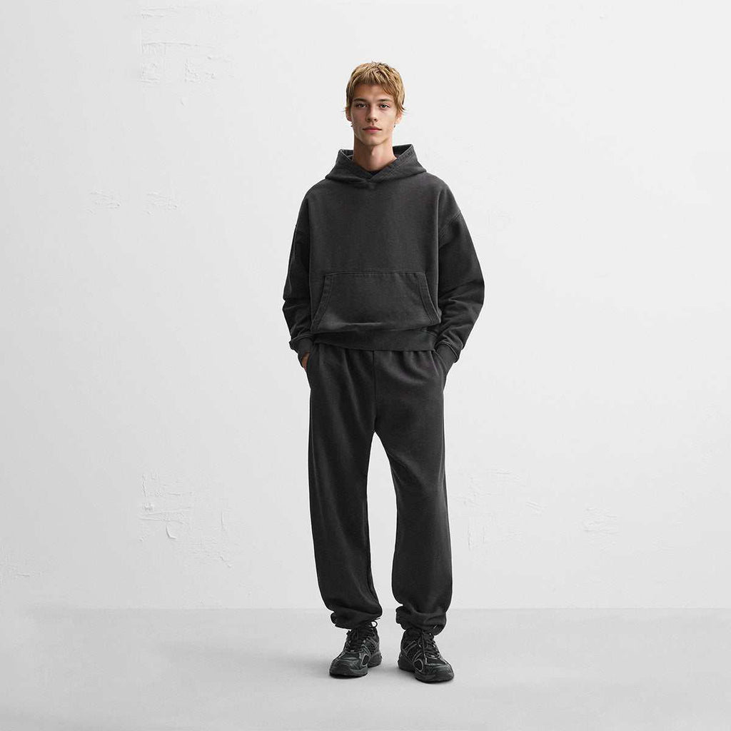 440GSM Unisex Heavyweight washed hoodie in charcoal cotton with a boxy fit, kangaroo pocket, and matching relaxed joggers